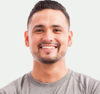 man-smiling-portrait-grey-background-800h